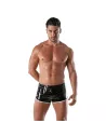 man wearing black and white vinyl fetish shorts from front with wide shot