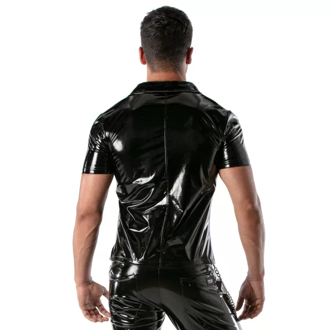 man wearing a black vinyl zipped vest from the back